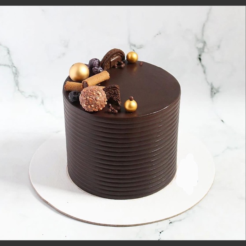 Chocolate cake delivery in Bondeni Kitui - Rich ganache from Hussein Bakes bakery